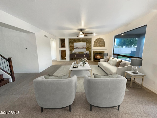 living room with light carpet and ceiling fan