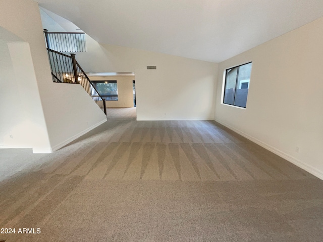 spare room with light colored carpet