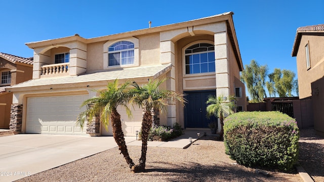 view of front of property with a garage