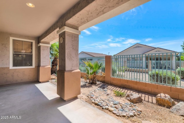 view of patio / terrace with fence