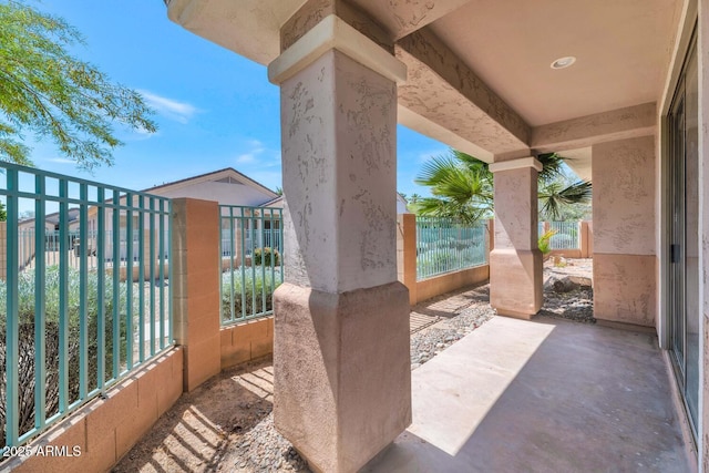 view of patio / terrace featuring fence