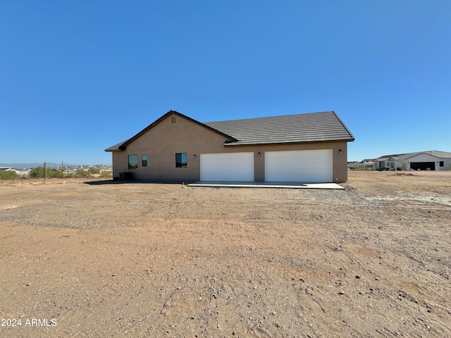 exterior space featuring a garage