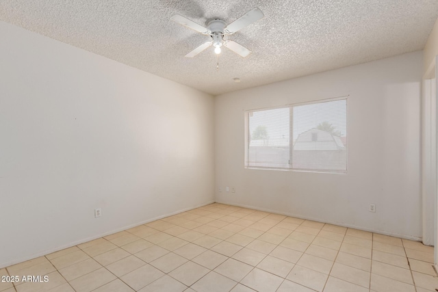 5933 W Mitchell Dr, Phoenix, AZ 85033 - spare room featuring a textured ceiling, a ceiling fan, and light tile patterned floors