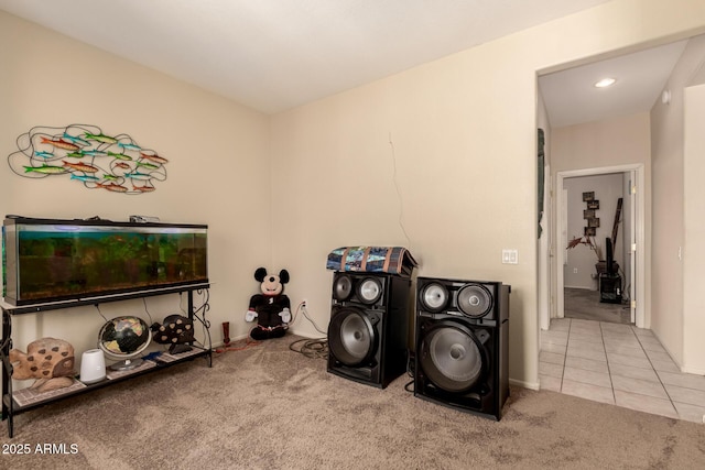 15874 W Wildflower Dr, Surprise, AZ 85374 - recreation room featuring carpet and tile patterned floors