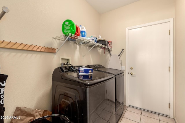 15874 W Wildflower Dr, Surprise, AZ 85374 - laundry area with washer and dryer and light tile patterned flooring