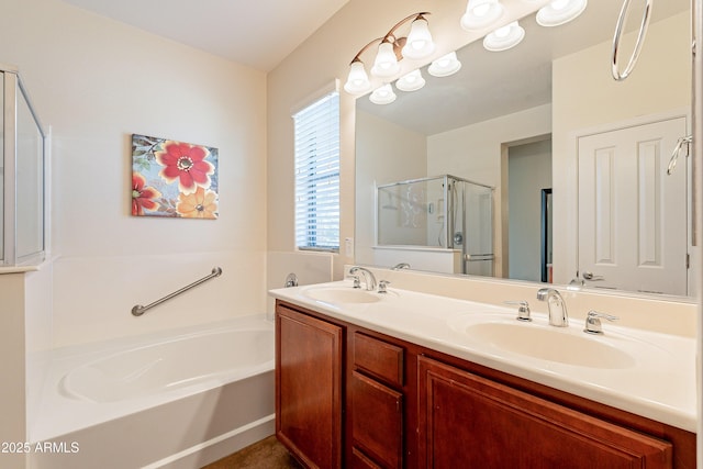 bathroom with vanity and separate shower and tub