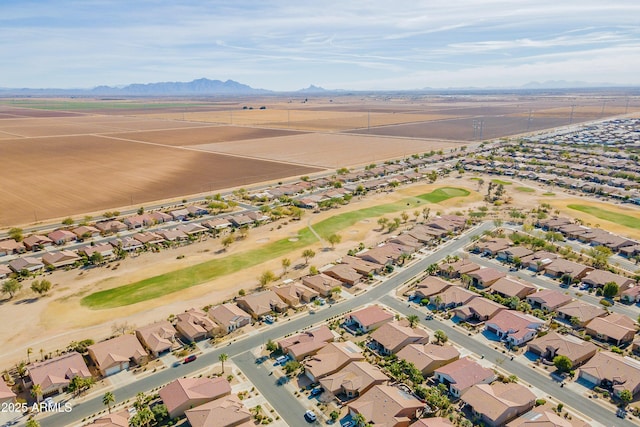 birds eye view of property featuring a mountain view