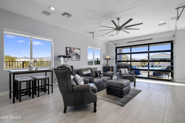 living room with ceiling fan