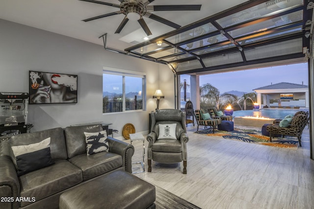 living room with ceiling fan