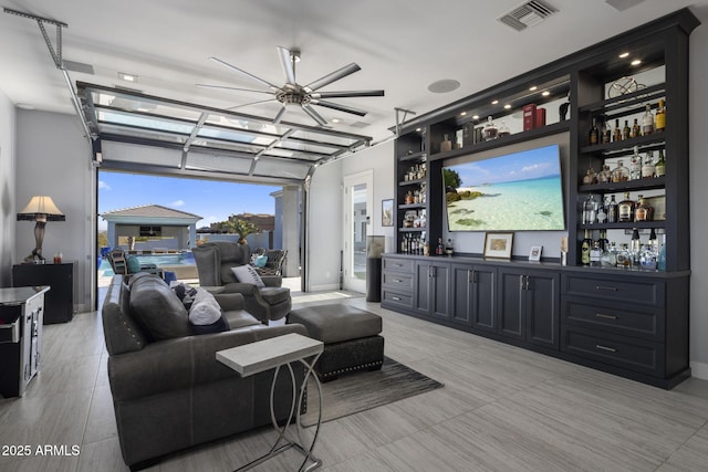 living room featuring indoor bar