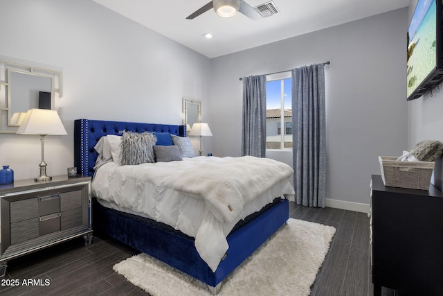 bedroom featuring dark hardwood / wood-style floors and ceiling fan