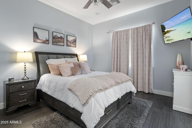 bedroom with dark wood-type flooring and ceiling fan