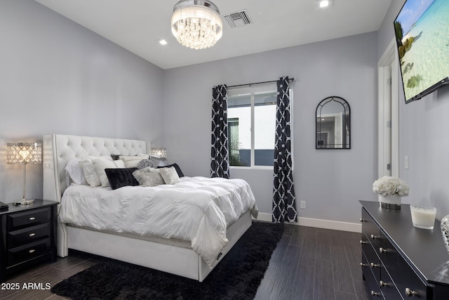 bedroom with an inviting chandelier