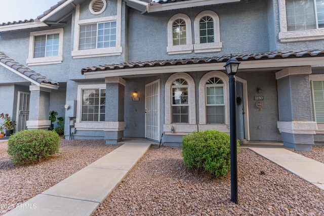 860 N Mcqueen Rd Unit 1151, Chandler, AZ 85225 - multi unit property featuring a tiled roof, stucco siding, and a porch