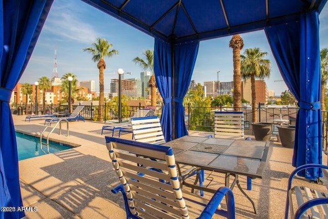 805 N 4th Ave Unit 508, Phoenix, AZ 85003 - view of patio / terrace featuring a community pool and a view of city