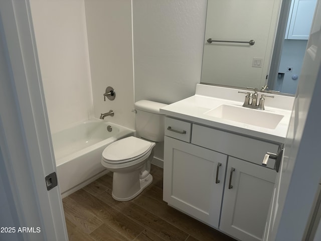 full bathroom with shower / bath combination, toilet, vanity, and wood finished floors