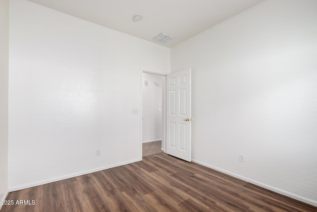 2556 W Amber Sun Dr, Phoenix, AZ 85085 - spare room with wood finished floors and baseboards
