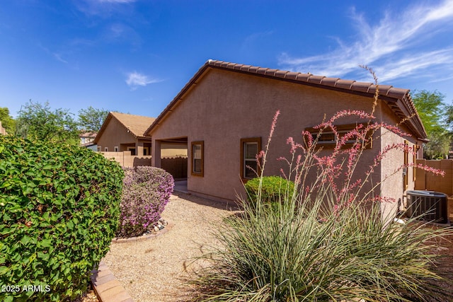 2556 W Amber Sun Dr, Phoenix, AZ 85085 - rear view of house featuring stucco siding and a tiled roof