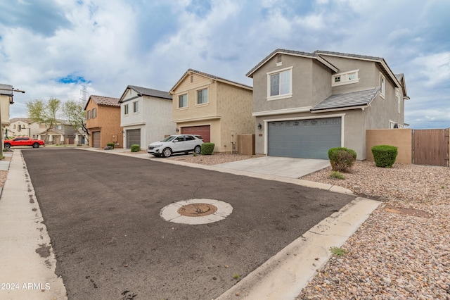 view of front of property featuring a garage