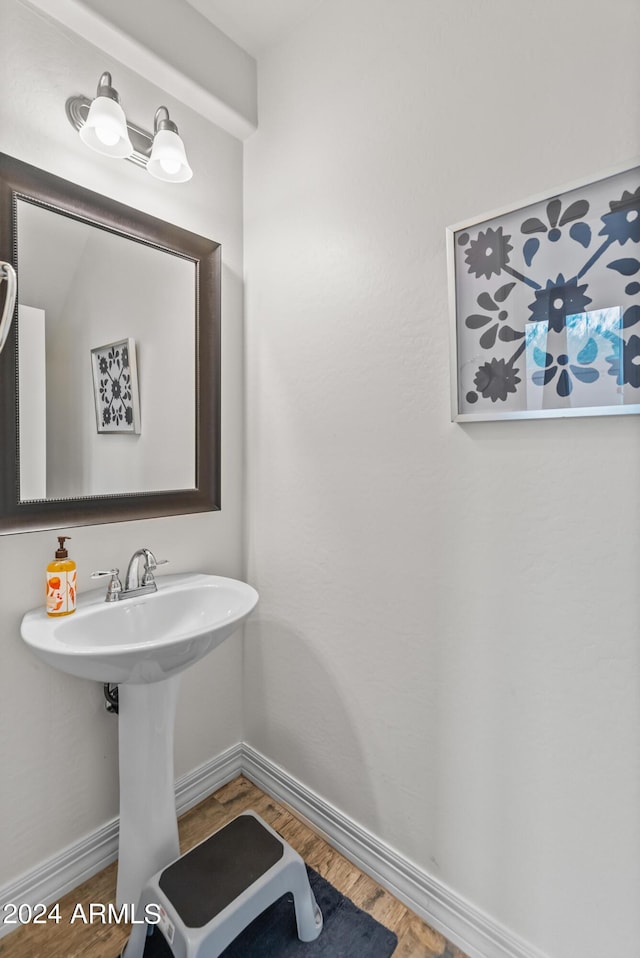 bathroom featuring hardwood / wood-style flooring