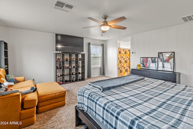 bedroom with light colored carpet and ceiling fan