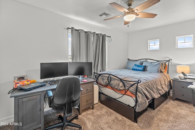 carpeted bedroom featuring ceiling fan