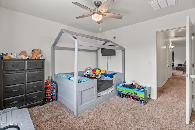 carpeted bedroom featuring ceiling fan