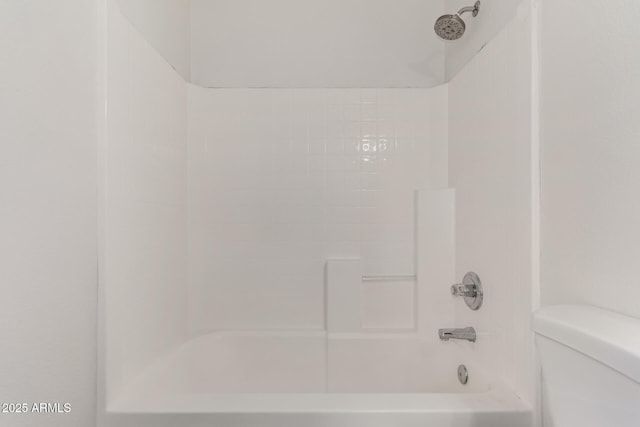 full bath featuring toilet and bathing tub / shower combination