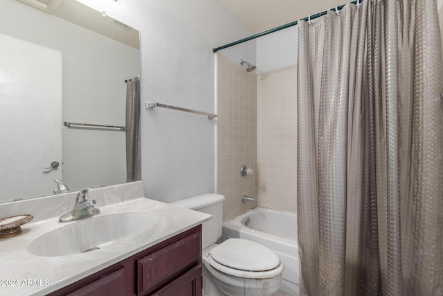 full bathroom featuring toilet, shower / bath combination with curtain, and vanity