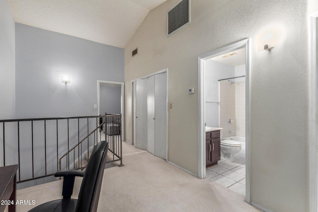 interior space with high vaulted ceiling, light colored carpet, and visible vents