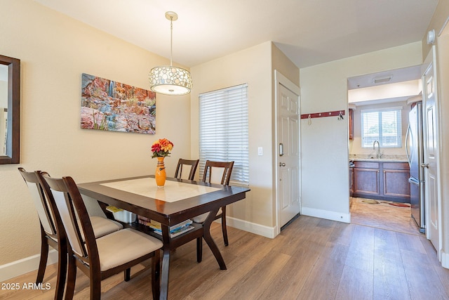 1825 W Ray Rd Unit 1068, Chandler, AZ 85224 - dining area featuring baseboards, light wood-type flooring, and visible vents