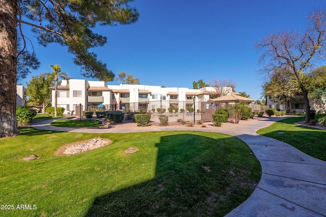 1825 W Ray Rd Unit 1068, Chandler, AZ 85224 - view of property's community with a residential view and a yard