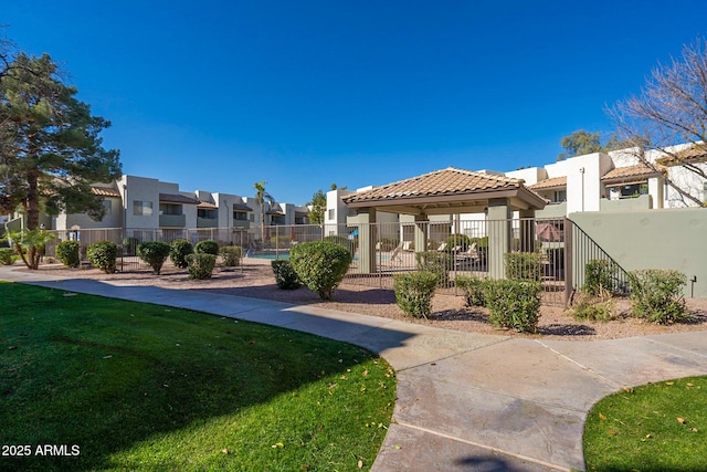 1825 W Ray Rd Unit 1068, Chandler, AZ 85224 - view of community with a residential view, fence, and a lawn