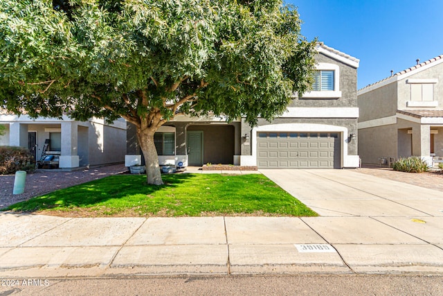 view of property hidden behind natural elements featuring a garage