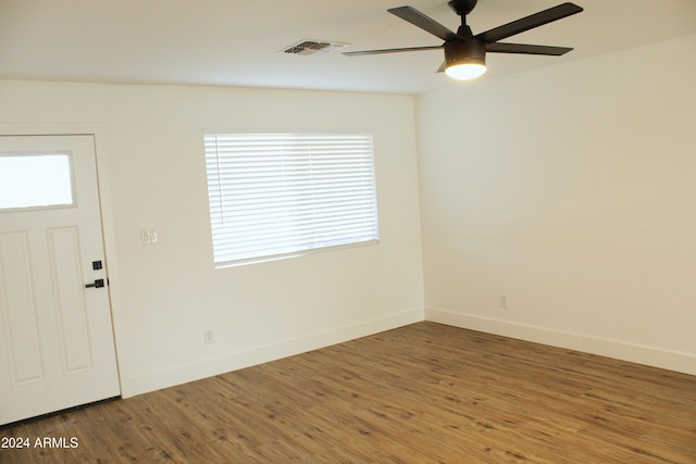 entrance foyer with ceiling fan and hardwood / wood-style flooring