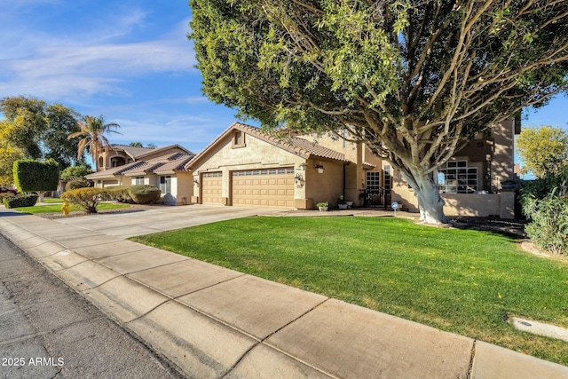 view of front facade featuring a garage and a front lawn