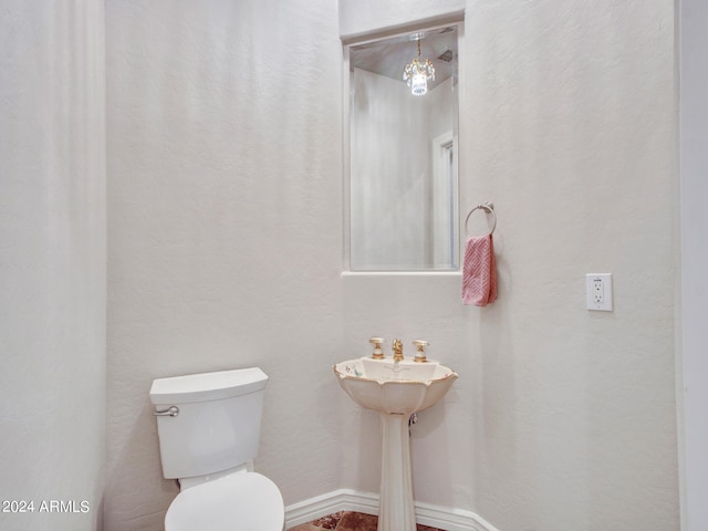 bathroom featuring toilet