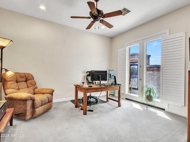 office space with carpet and ceiling fan