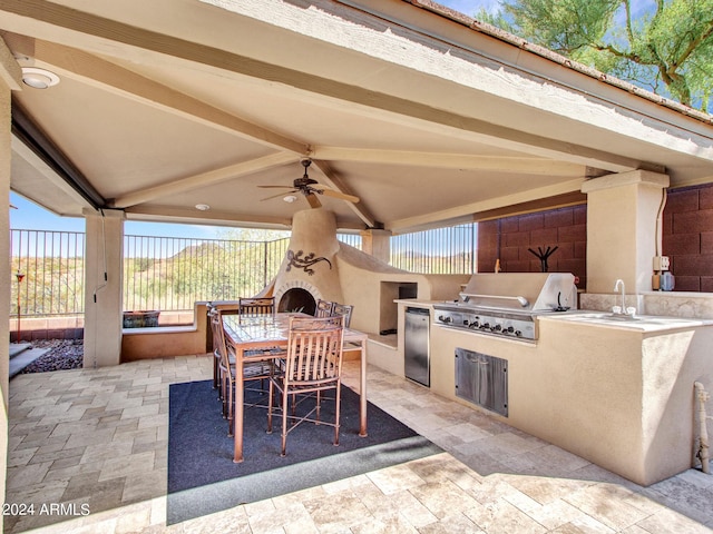 3220 W Feather Sound Dr, Anthem, AZ 85086 - view of patio with ceiling fan, a fireplace, a grill, exterior kitchen, and outdoor dining space