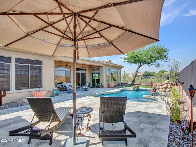 view of swimming pool with a patio