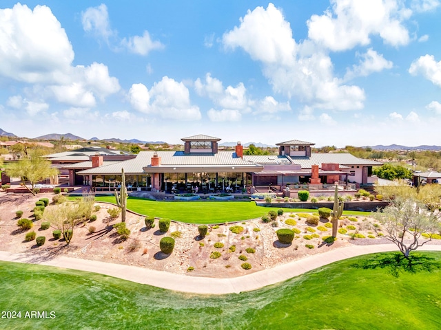 3220 W Feather Sound Dr, Anthem, AZ 85086 - surrounding community featuring a mountain view and a lawn