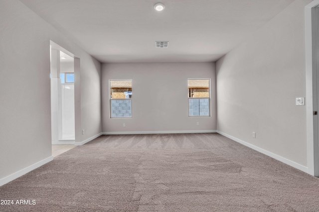 view of carpeted spare room