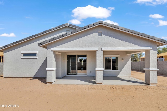 rear view of house with a patio area