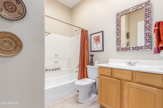 full bathroom with vanity, shower / tub combo with curtain, toilet, and tile patterned floors