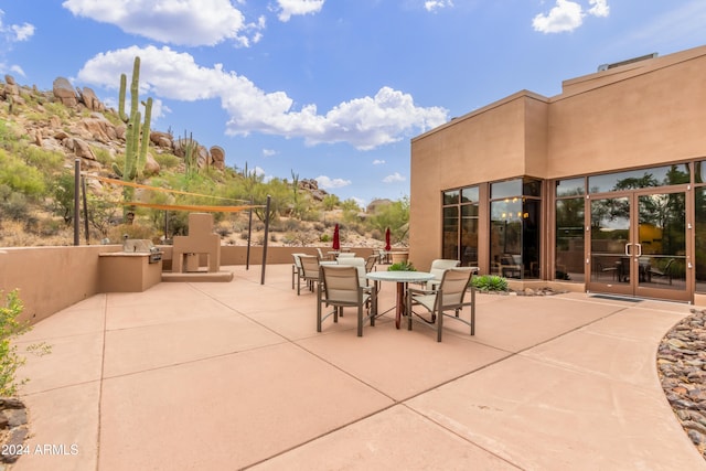 view of patio with exterior kitchen