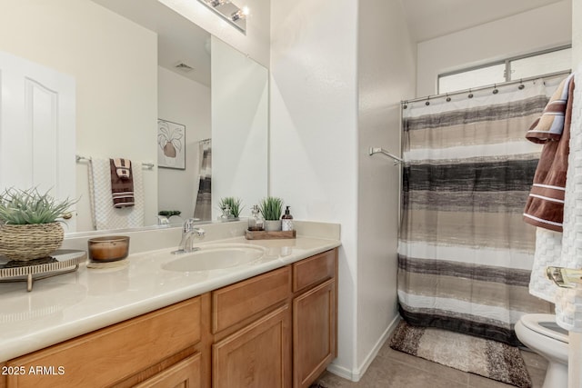 full bath featuring toilet, a shower with shower curtain, visible vents, vanity, and tile patterned floors