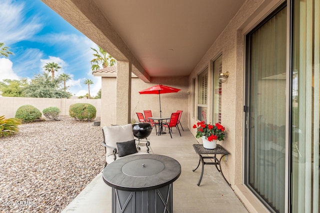 view of patio / terrace with fence