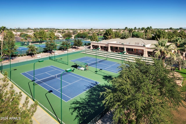 view of sport court with fence