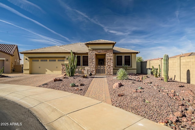 view of front of property featuring a garage