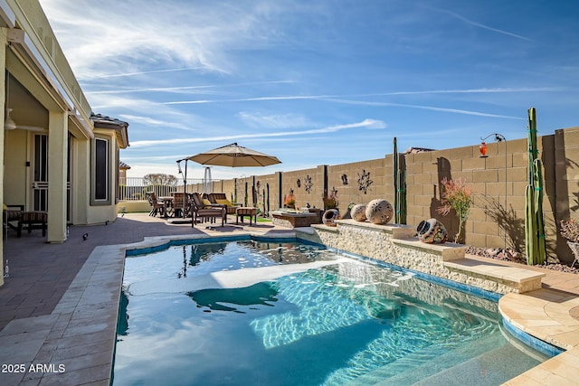 view of swimming pool featuring a patio area